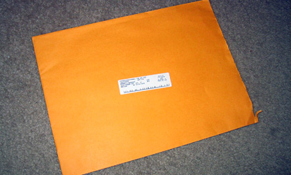 A photo of what the envelope and shipping label look like.